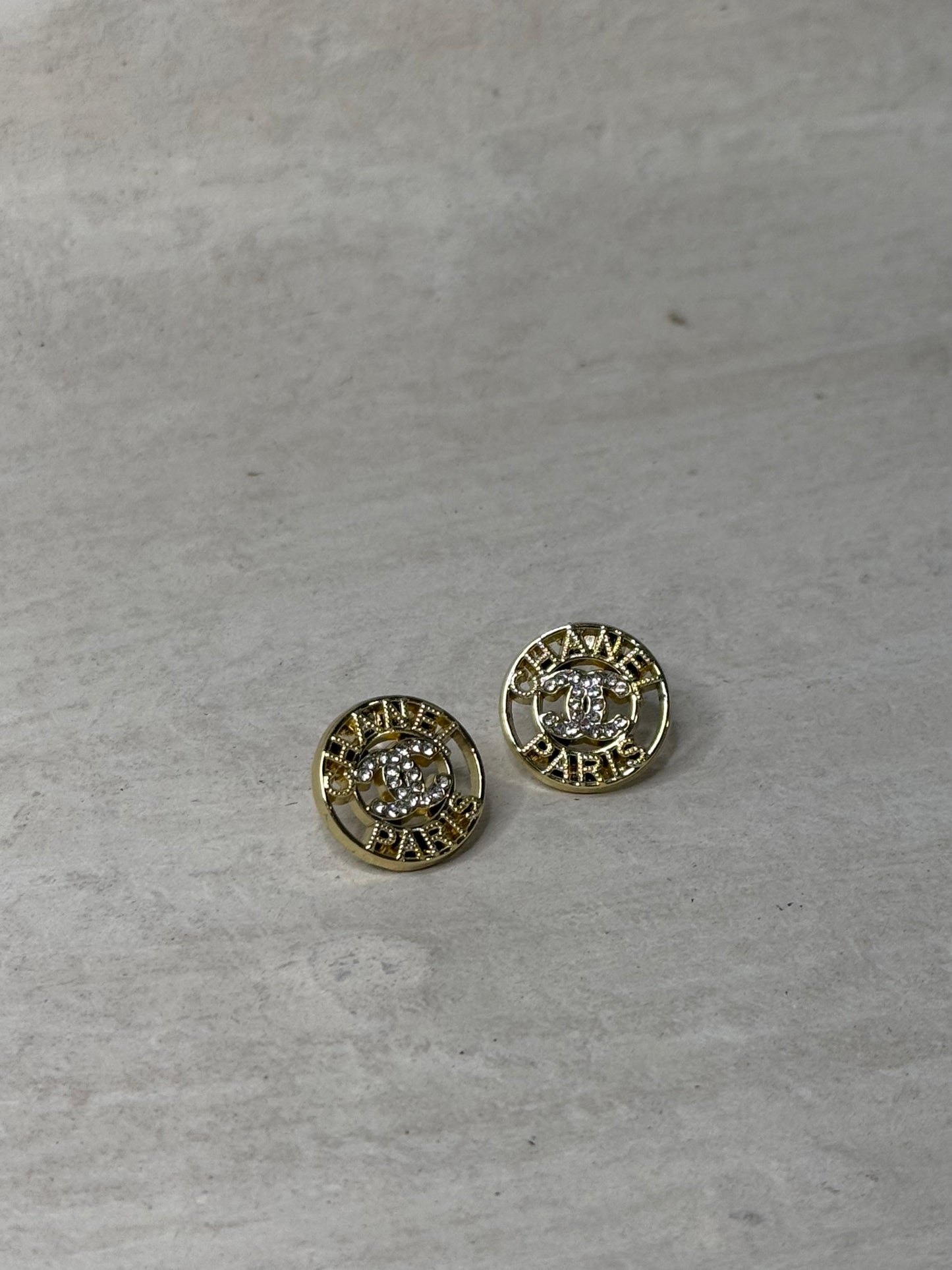 Refined Round Diamond Accent 5/8" Width Earrings with Iconic Logo Design