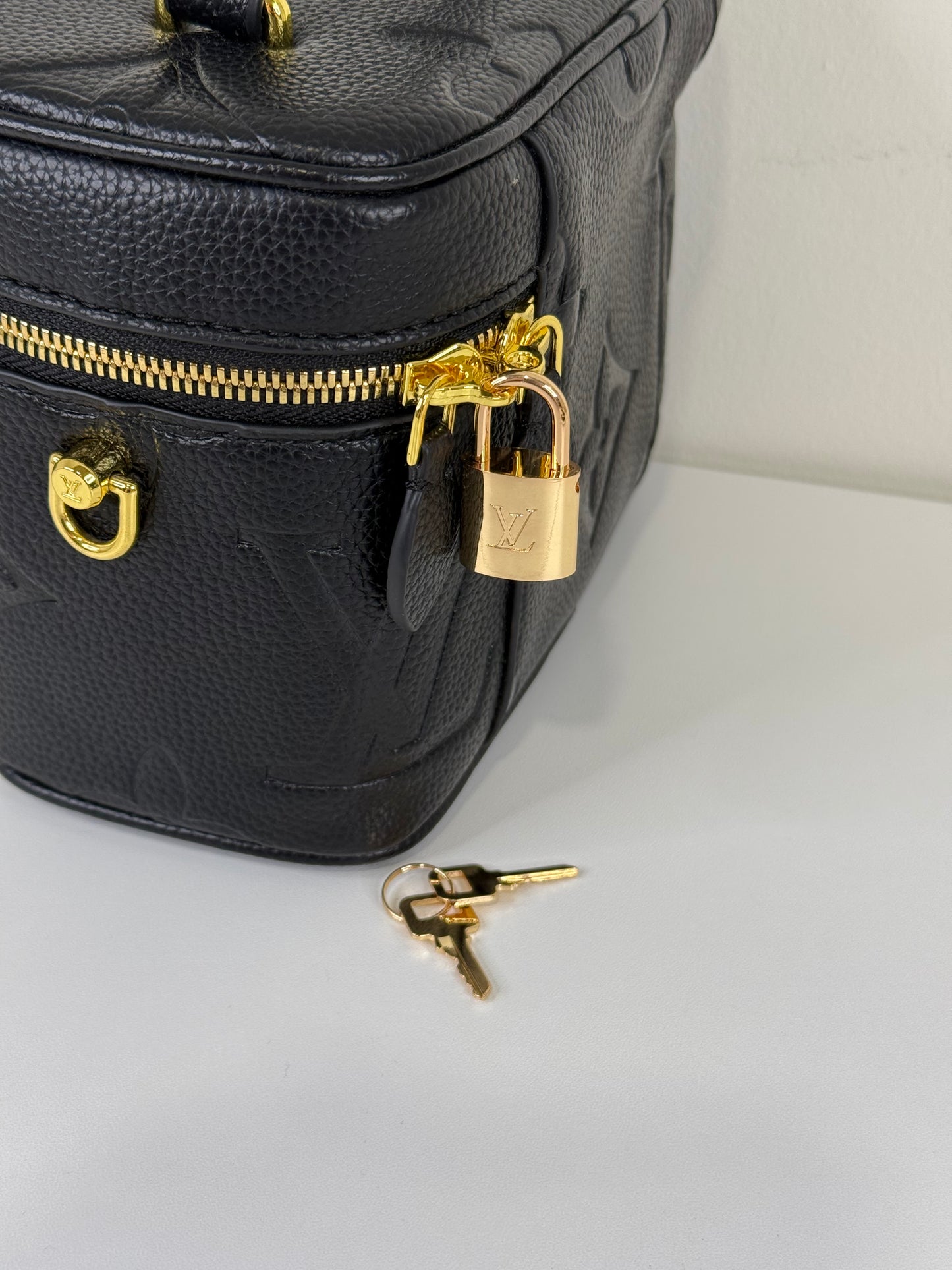 Sleek Black Imprint Shoulder Bag