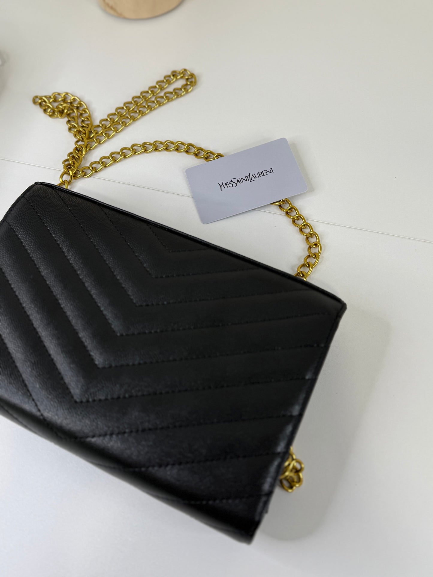 Refined Black Bag Chain Accent and Slim Profile