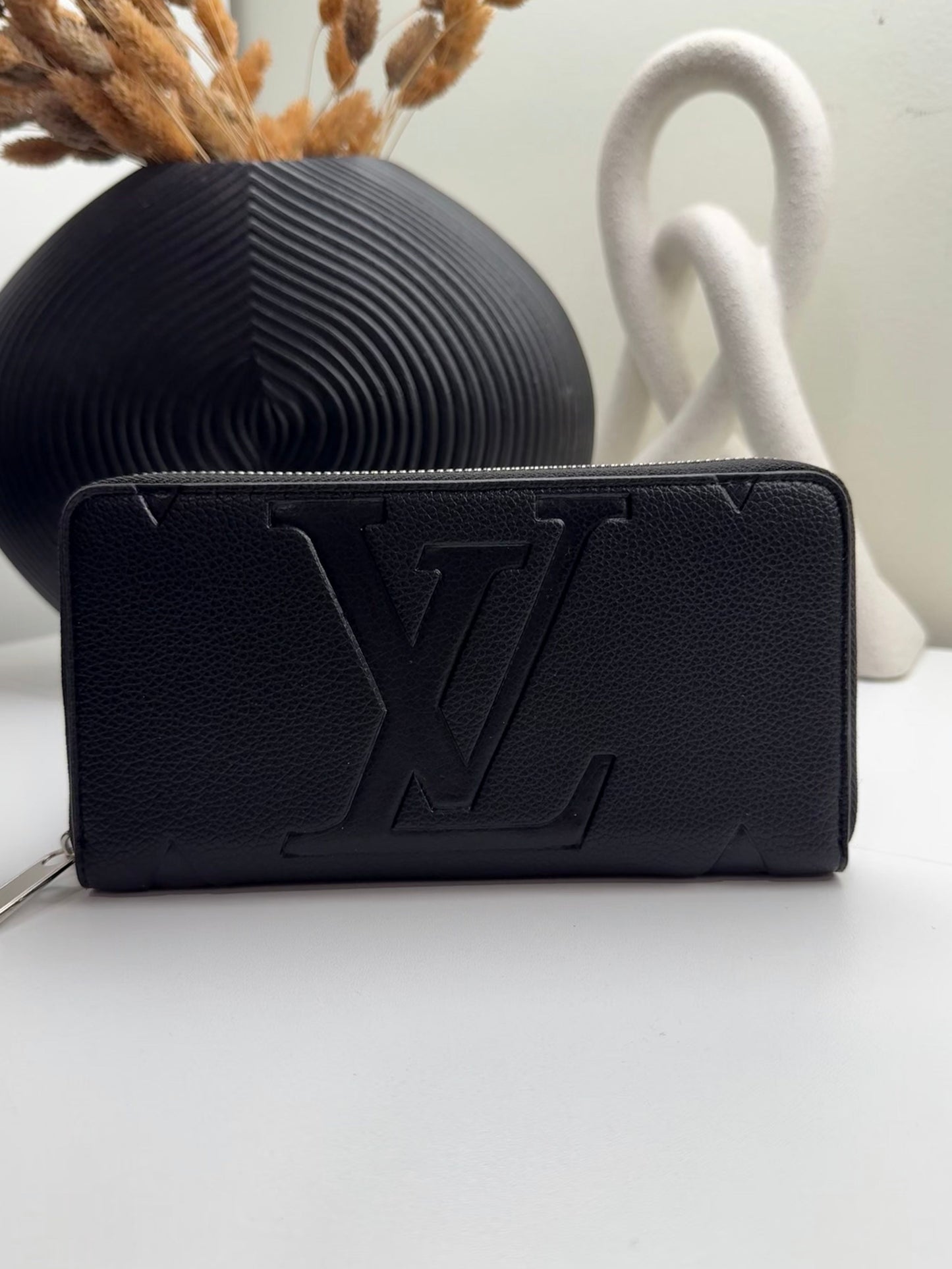 Sleek Debossed Leather Bi-Fold Wallet