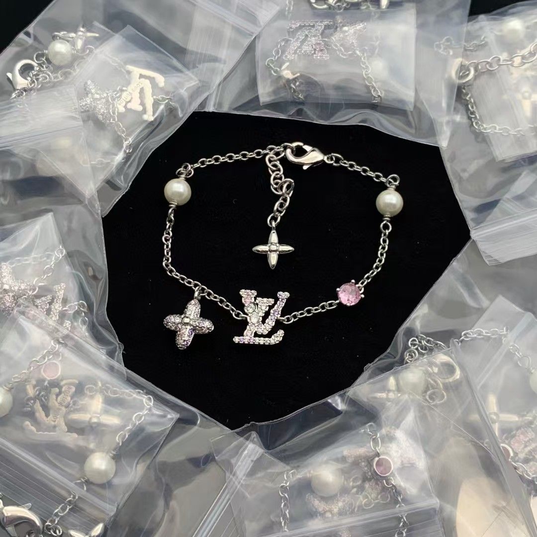 Sparkling Charm Bracelet with Faux Pearls and Pink Gem