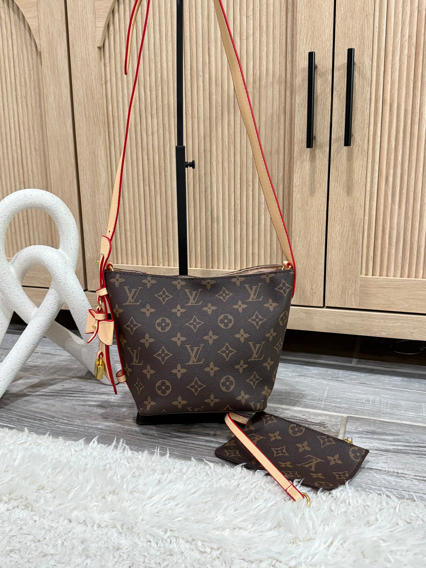 Chic Brown Monogram Crossbody Bag with Vivid Red Trim and Removable Pouch