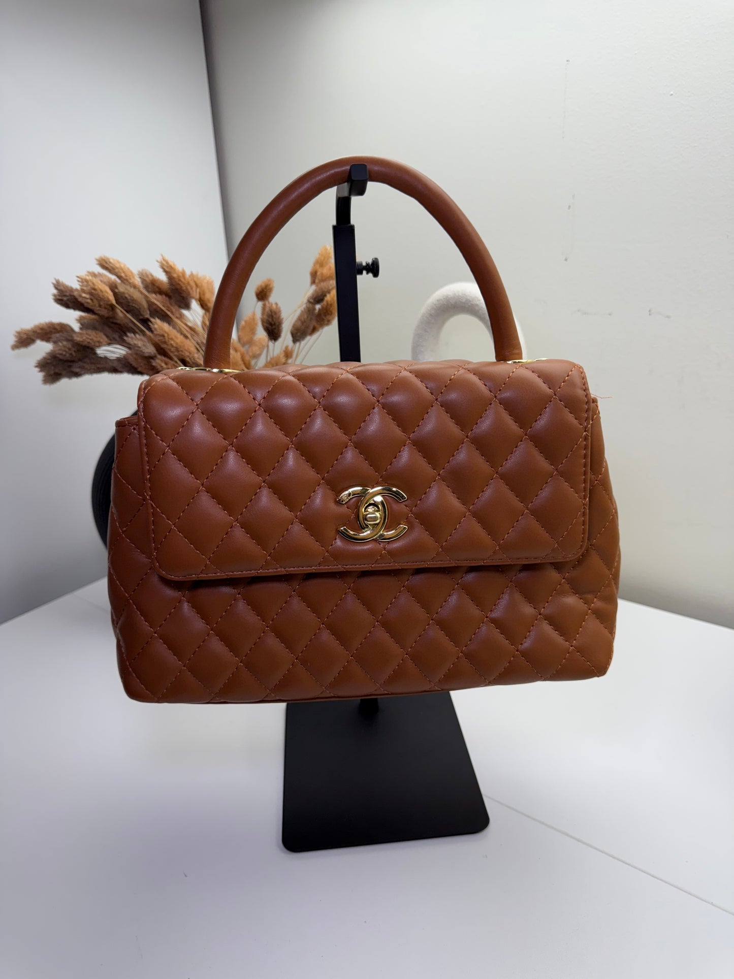 Elegant Quilted Handbag with Gold Tone Turnlock Closure