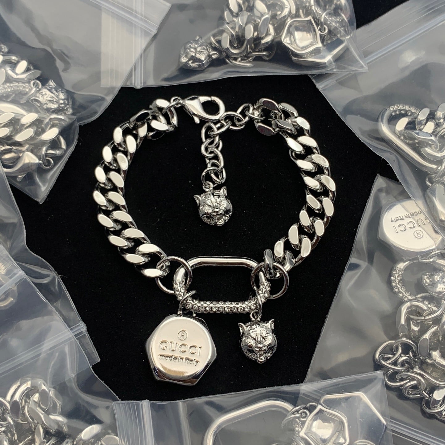 Luxurious Curb Chain Bracelet with Pave Detailing and Dual Animal Charms