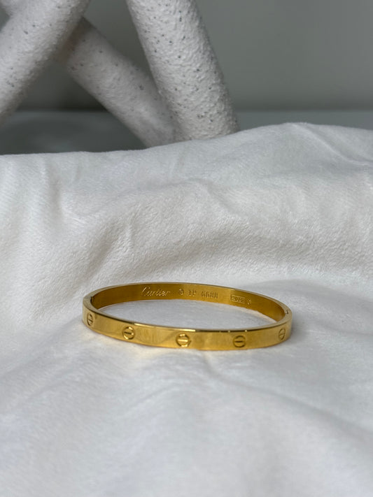 Elegant 7" 1/2" Width Bangle with Unique Design