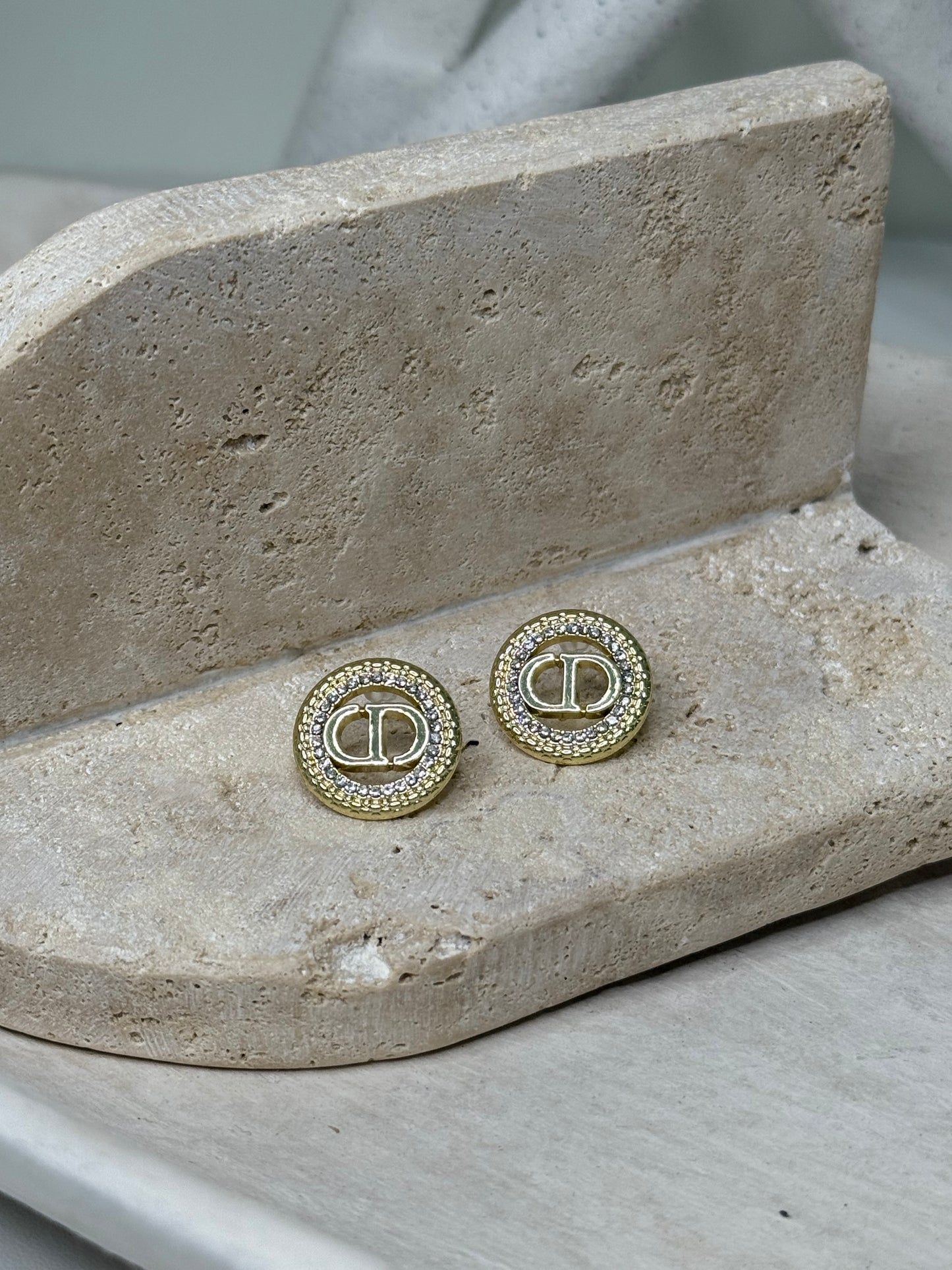 Distinctive Round Logo 13/16" Width Earrings with Textured Snake Rim