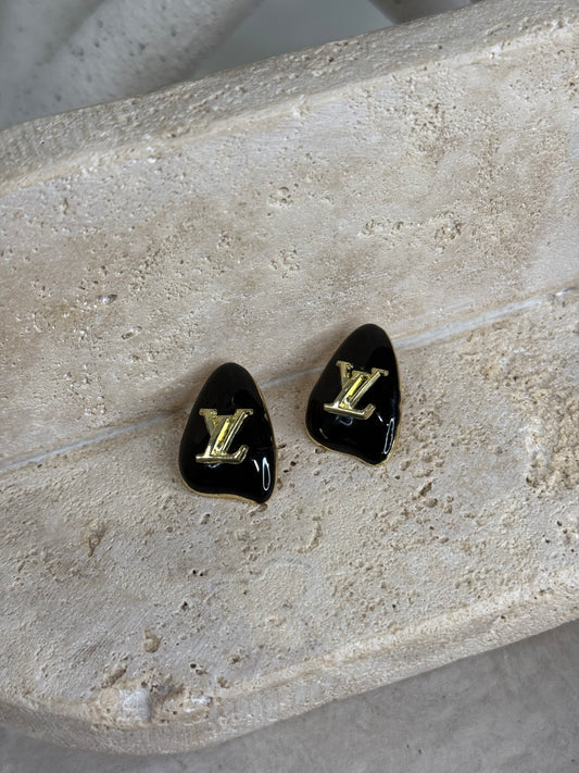 Captivating Black Petal Shaped 1" Width Earrings with Gold Logo Accents