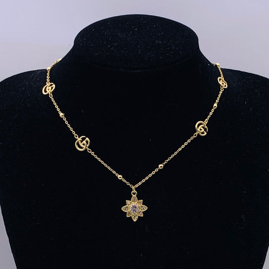 Sophisticated Gold Flower Pendant Necklace with Interlocking Loop Accents