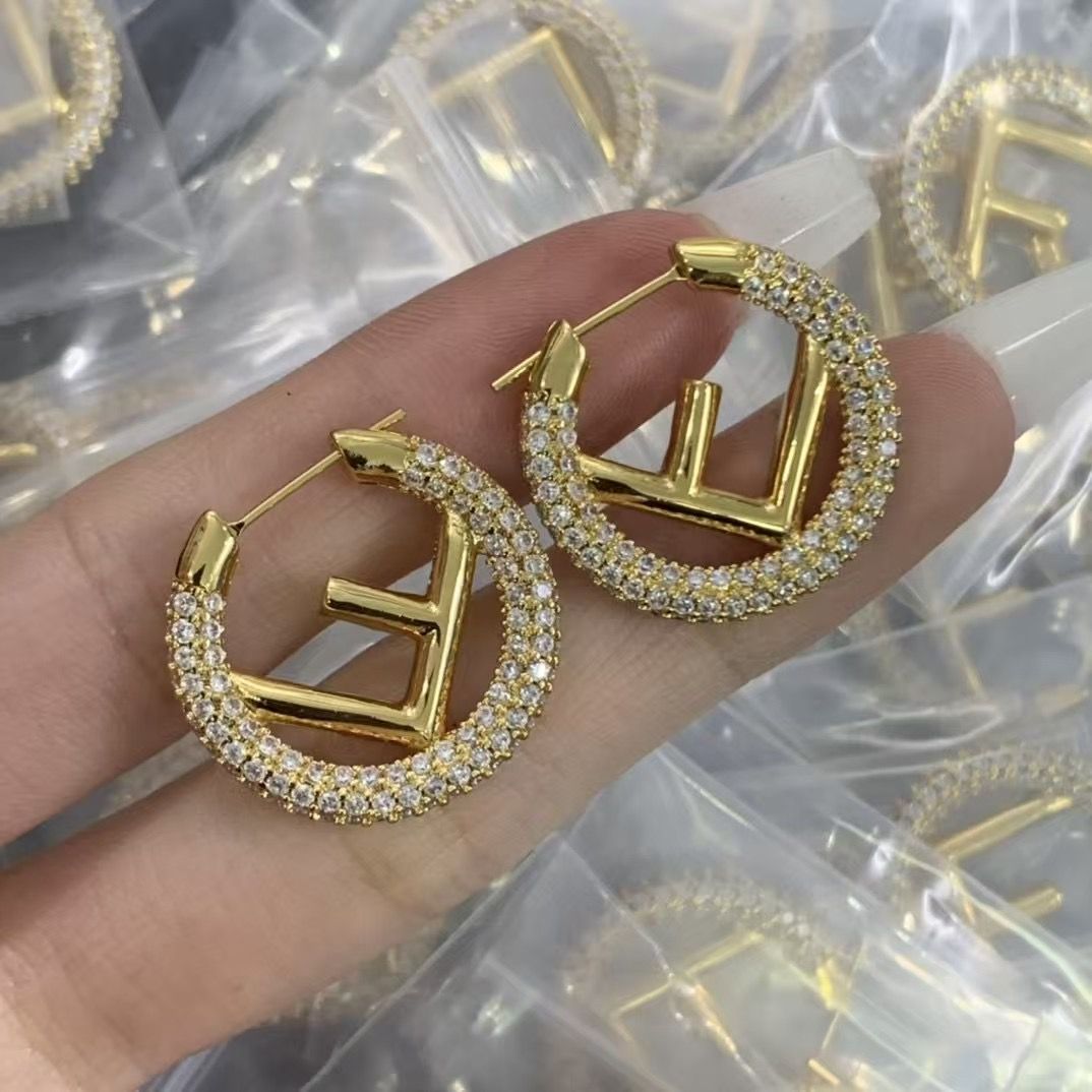Dazzling Gold Tone Initial Hoop Earrings