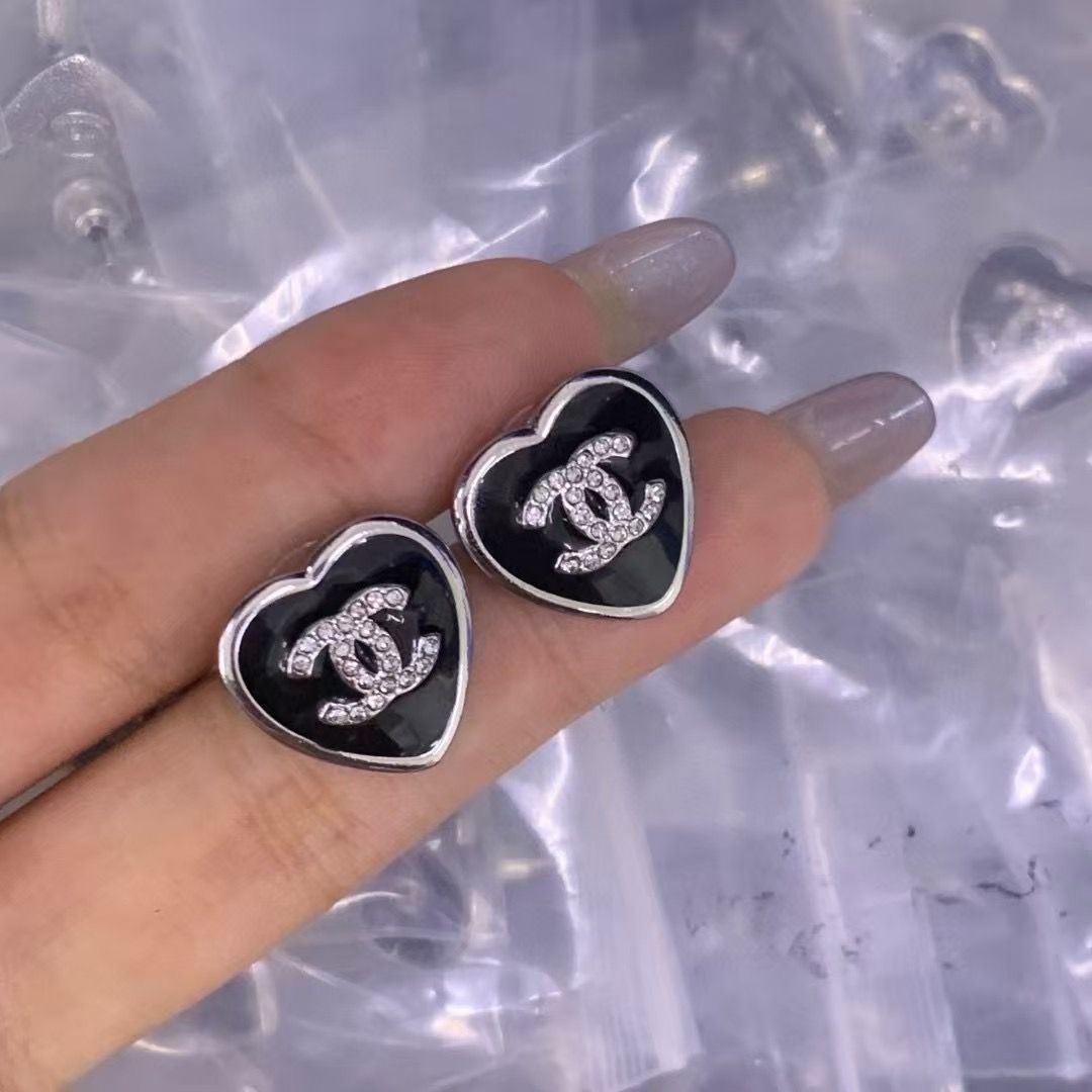 Glamorous Interlocking Crystal Heart Studs