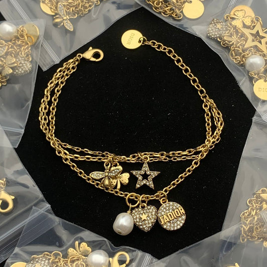 Dazzling Gold Layered Bracelet with Crystal Charms