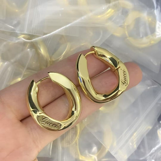 Modern Polished Gold Huggie Earrings