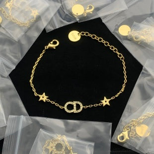 Dainty Gold Tone Crystal Star Charm Bracelet