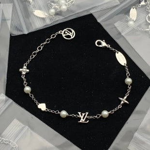 Elegant Charm Link Bracelet with Faux Pearls