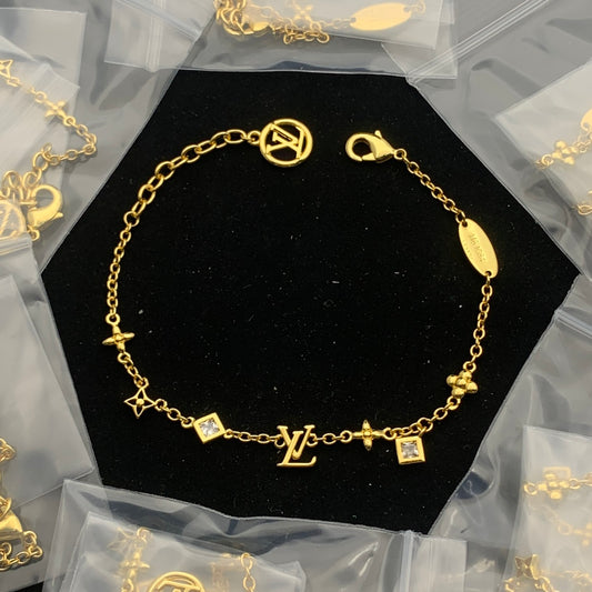 Iconic Flower & Initial Charm Bracelet