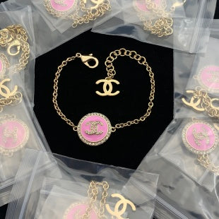 Elegant Pink & Gold Tone Charm Bracelet