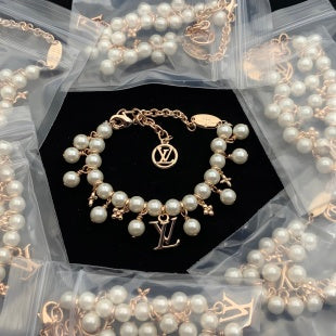 Dainty Pearl and Gold Charm Bracelet