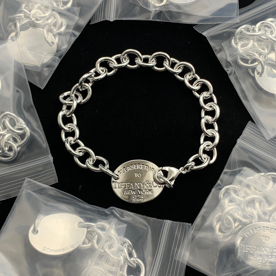 Classy Gold Cable Chain Bracelet with Engravable Round Tag