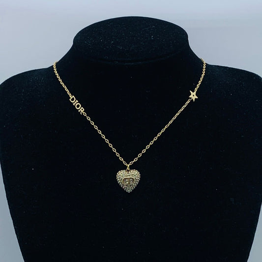 Classy Gold Heart Pendant Necklace with Crystal Detailing and Star Charm