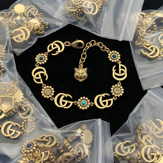 Intricate Tiger Head Pendant Bracelet with Colorful Gemstone Flowers