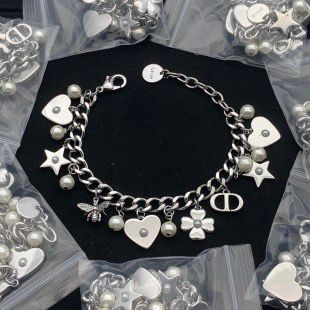 Whimsical Silver Tone Link Bracelet with Dangling Charms
